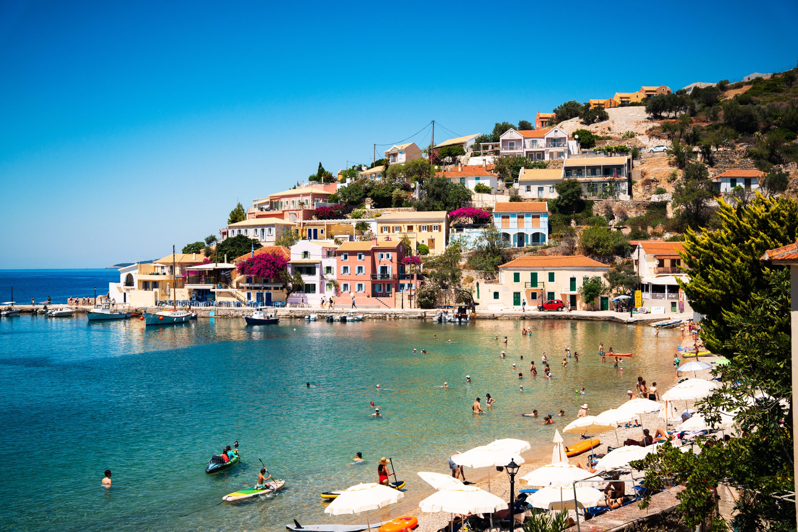 A panoramic view of the Greek town of Assos overlooking the bay, taken with a Sigma 28–105mm lens